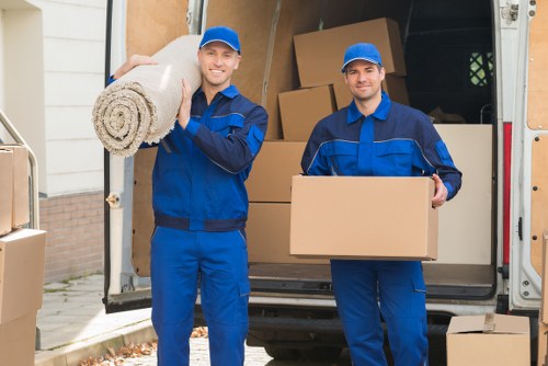 Moving team handling boxes during a local removal in Pinner