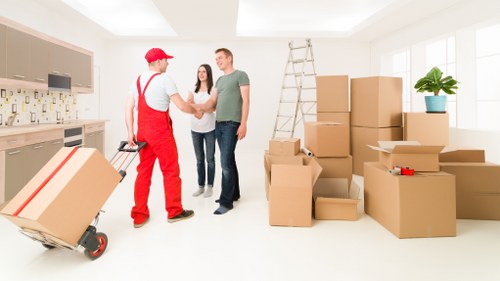 Packed household boxes and furniture stored safely in Pinner