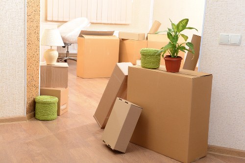 Packed moving boxes ready for house removals in Pinner home